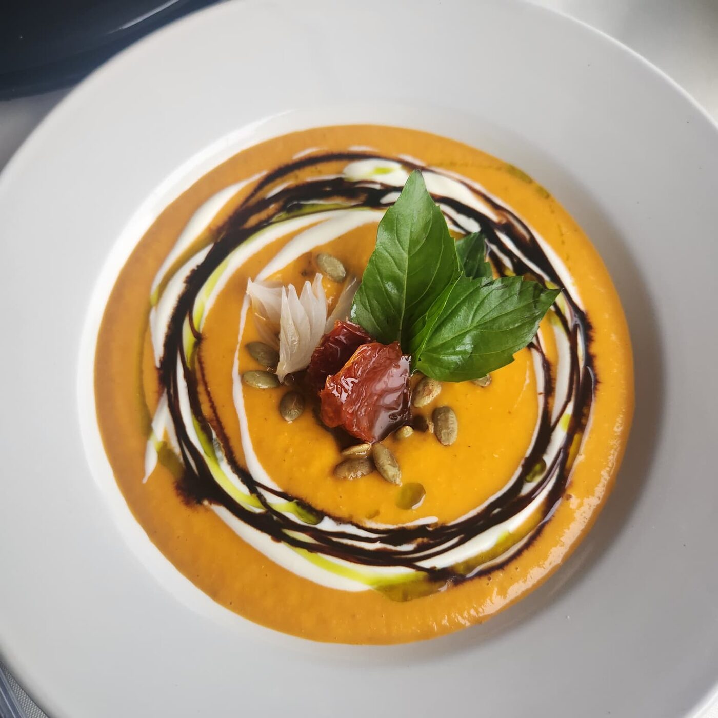 Watermelon and tomato gazpacho with crème fraîche