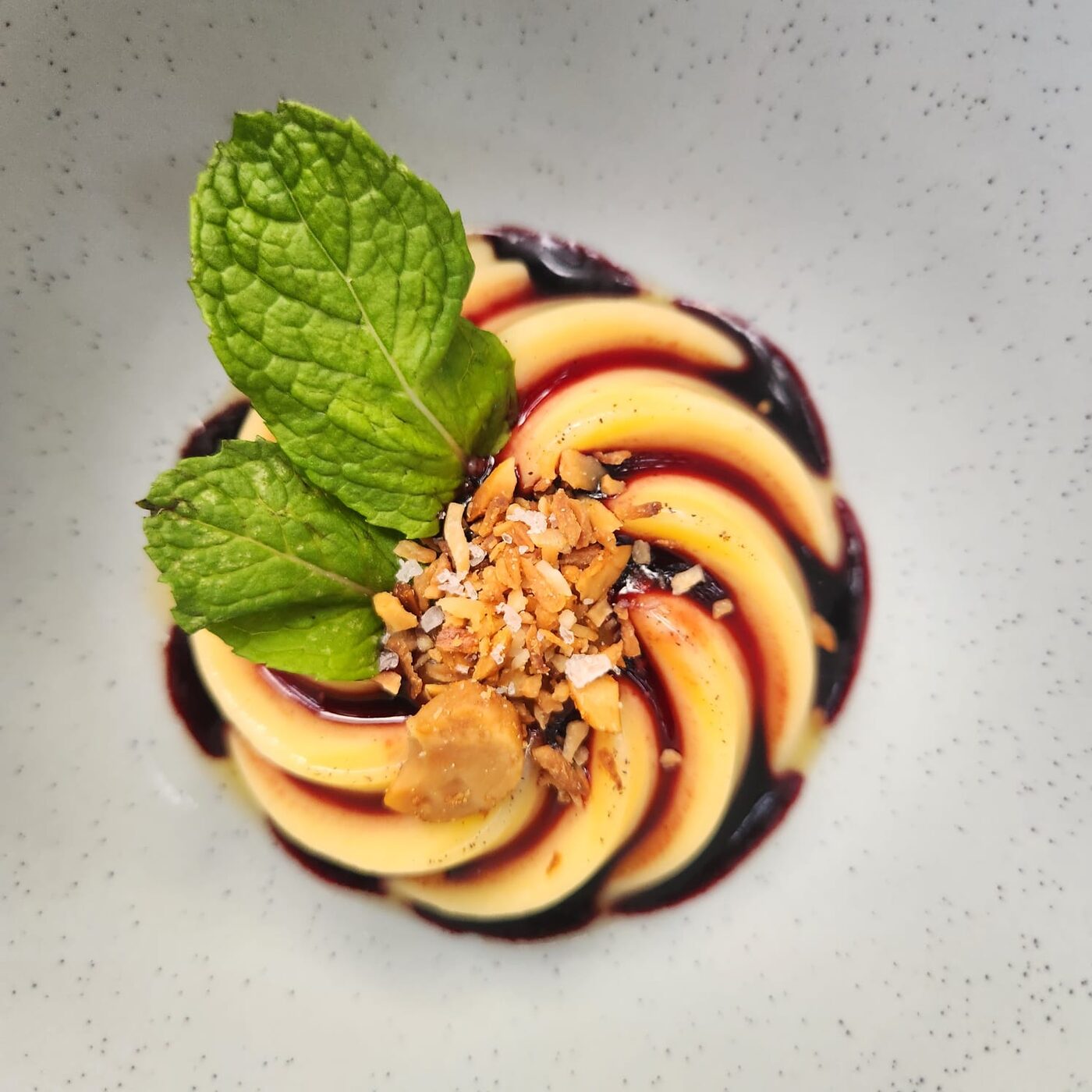 Allspice panna cotta with toasted macadamia and coconut